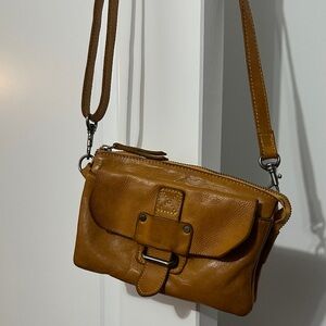 Compact Tan Leather Crossbody Bag with Front Buckle